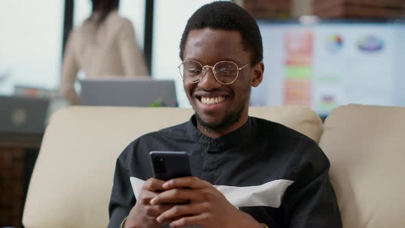 Business Person Using Smartphone to Text Messages