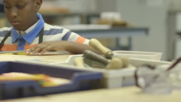 MS Tracking Left School children practising with work tool