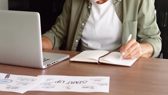 Male executive working at desk