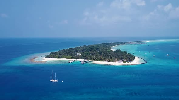 Aerial landscape of seashore beach by blue ocean and sand background