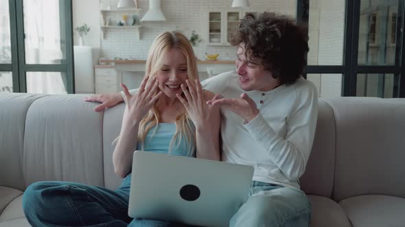 Couple Going Get Married Boyfriend and Girlfriend Sitting on Couch Making Video Call Conference