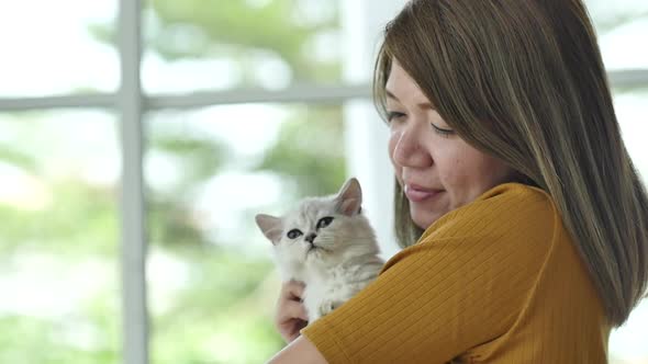 Beautiful Asian Woman Holding Cute Kitten,Slow Motion