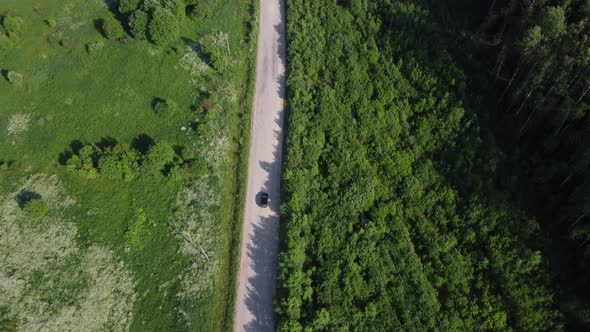 Flying Over the Road in the Field