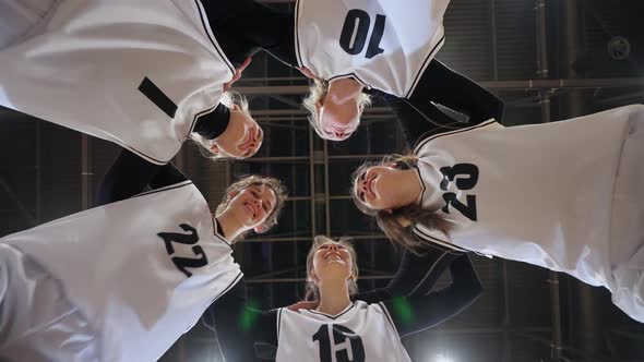 Slow Motion Team of Basketball Players Shouts Chants and Raising Morale Before the Game the