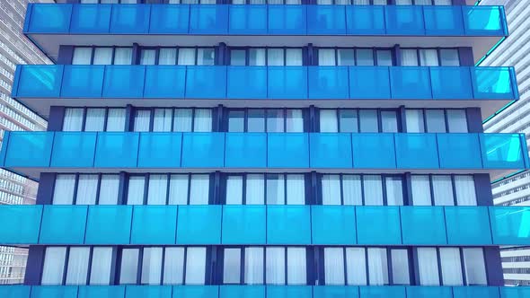 facade of a modern mirrored office building was removed from a drone. close-up