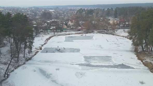 Children Playing On Frozen Lake