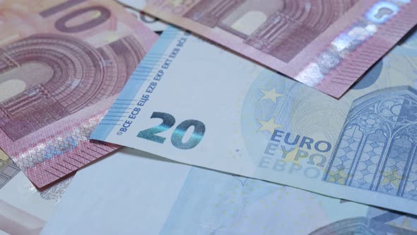 Business background made of European Union currency lot tilting 4K 3840X2160 UltraHD video - Backgro