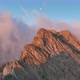 Dolomites mountains peaks with a hiking path on a summer sunrise - VideoHive Item for Sale