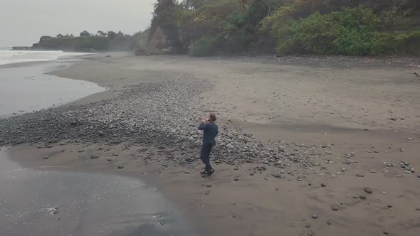 Lonely Man On Empty Beach