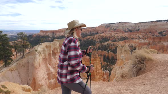 Adult Woman Hiking In The Rocks Of Bryce Canyon