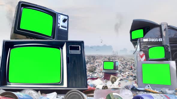 Retro TVs Green Screen in a Landfill with Birds in the Sky.