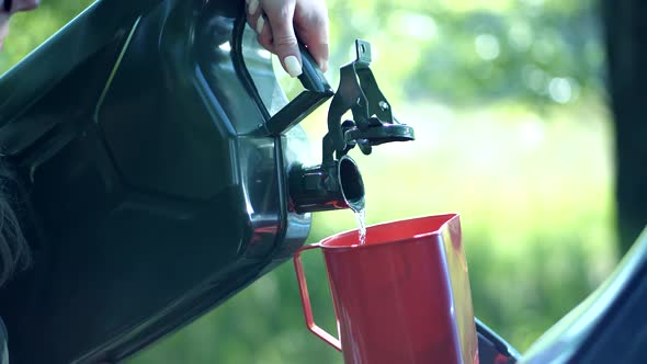 Filling Bio Diesel Into Gas Tank Canister. Refilling Gasoline Fuel Tank Car. Petrol Crisis Price.