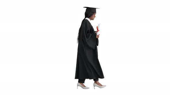 Young African Graduate Student Walking and Laughing on White Background