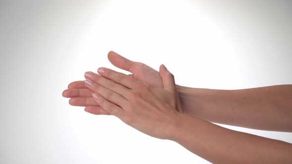 Women's Hands Clap Their Palms  Gesture Applause on a White Background