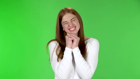 Portrait of Pretty Young Woman Smiles with Happy Joy.