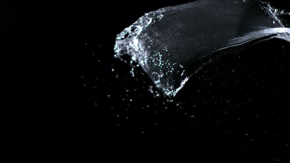 Super Slowmotion Shot of Water Splash Against Black