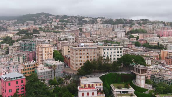 Cityscape of Genoa, aerial vertigo effect while flying backward