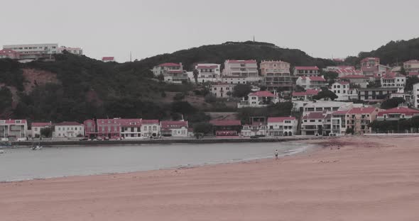 Panoramic Scenery Of Beautiful Old Buildings By The Hillside Nearby A Beach In Sao Martinho do Porto