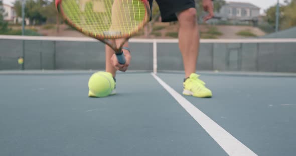 Closeup View of Male Tennis Player Wearing Yellow Sneakers