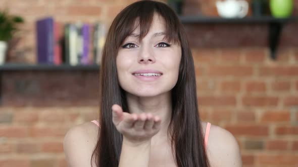 Flying Kiss by Beautiful Woman, Indoor Portrait