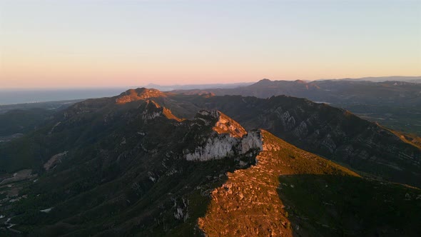 Aerial view of mountains at sunset near the mediterranean coast near Valencia, Spain.