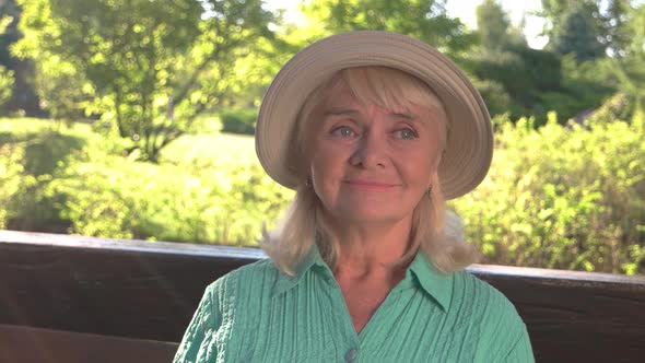 Senior Woman in Hat Smiling