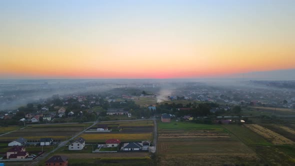 Aerial View of Agricultural Waste Bonfires From Dry Grass and Straw Stubble Burning with Thick Smoke