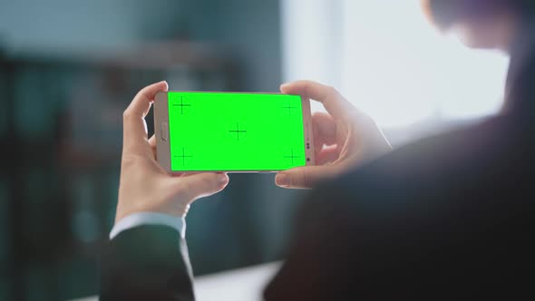 Business Woman Using Smartphone for Video Chat