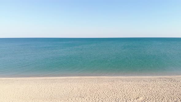 Aerial View of Camera Movement Sideways on Morning Beach