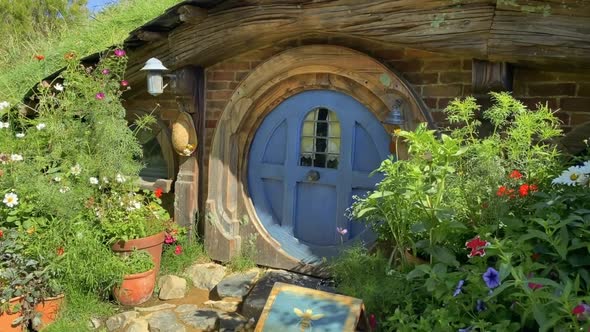 Hobbiton houses in New Zealand on a summers day.