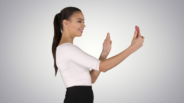 Young Latin Formal Woman Making a Video Call or Recording