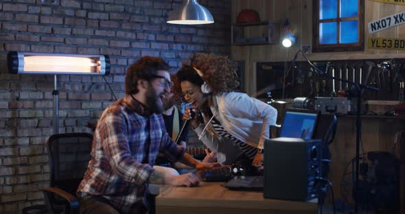 Young Musicians Playing in Home Studio