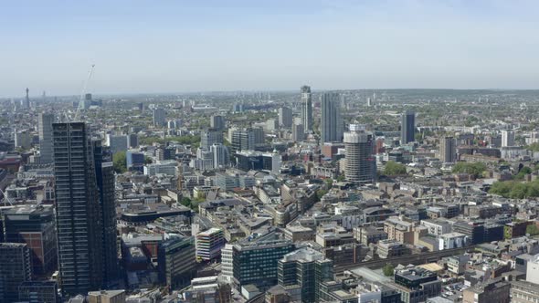 Establishing drone shot over shoreditch towards old street roundabout