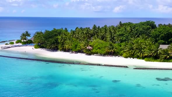 Aerial scenery of exotic seashore beach journey by blue lagoon with sand background