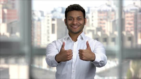 Happy Indian Man Shows Two Thumbs Up