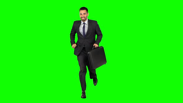 Businessman Is Running on Isolated Green Screen Background.