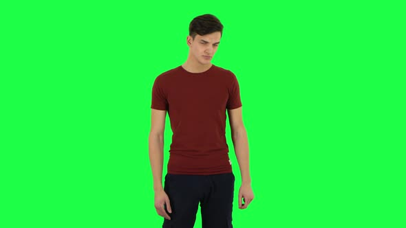 Guy Posing at the Camera. Green Screen