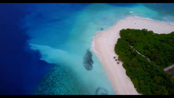 Aerial drone shot nature of tranquil coast beach journey by blue ocean with white sand background of