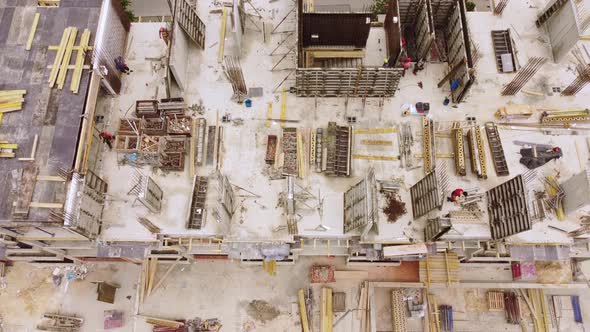 Busy Construction Site and Construction Equipment Aerial View