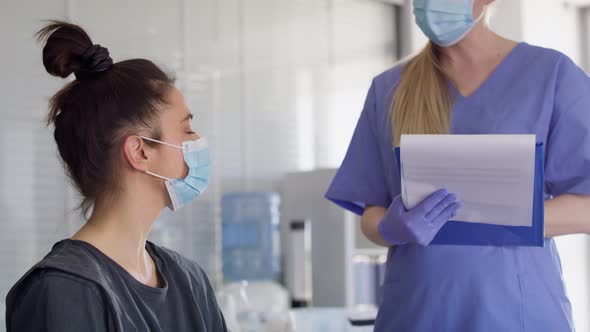 Video of woman during a medical interview before a travel. Shot with RED helium camera in 8K.