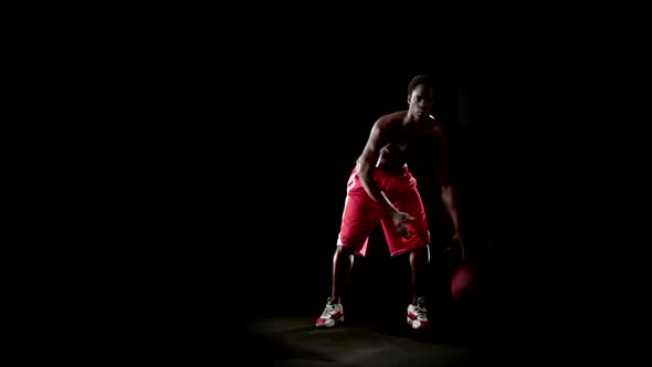 Man Play Basketball Isolated on Black