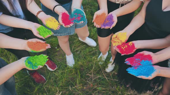 Holi Paints in the Hands of Girls