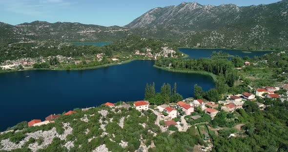 Aerial view of kitesurfing spot on the Neretva delta valley river.