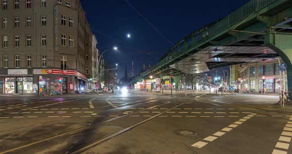 Traffic time lapse of busy street intersection at night