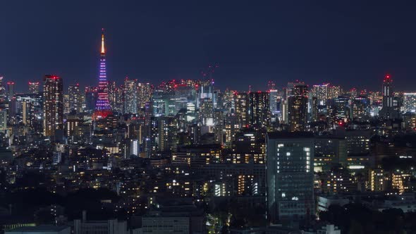 Time Lapse of the densely packed Tokyo Japan skyline shot at night