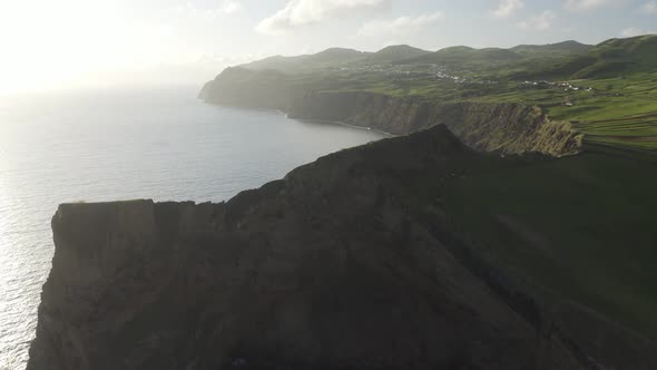 Aerial View of cliff overlooking the ocean, Baìa de Entre Morros, Velas, Azores.