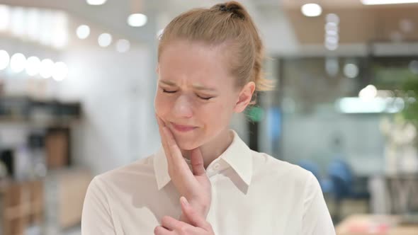 Portrait of Sick Young Businesswoman Having Toothache, Cavity