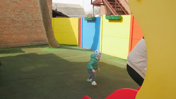 Mother Running With Children