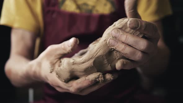 Serious Woman Working at Pottery Wheel in Studio Prepare Clay to Make Plate to Restaurant