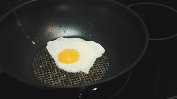 Close-up of Cooking Egg on a Frying Pan